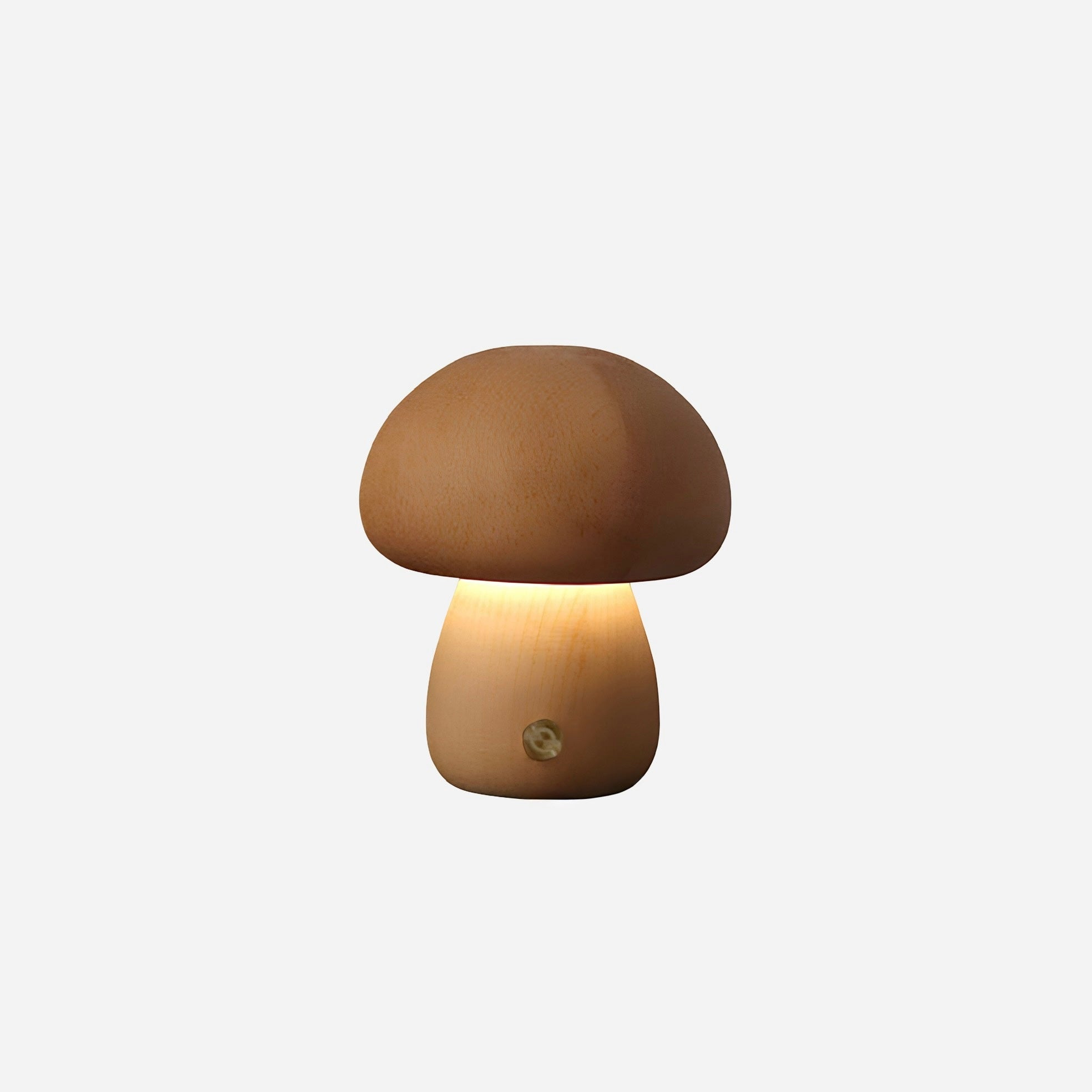 Mushroom-shaped lamp with a warm glow on a white background
