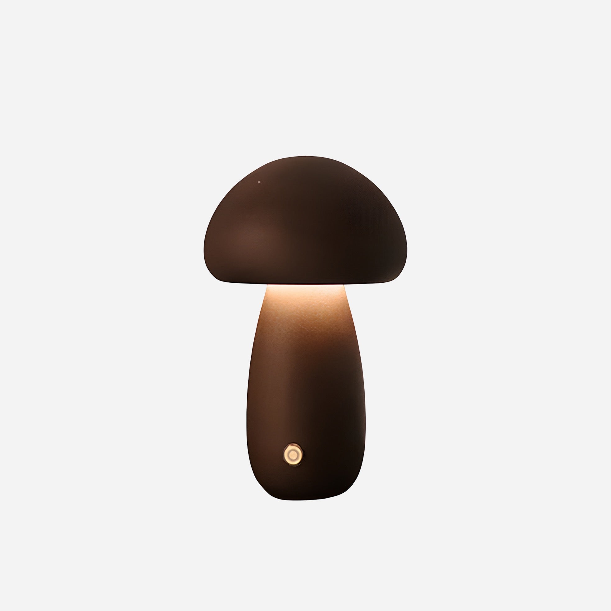 Mushroom-shaped lamp with a warm glow on a white background