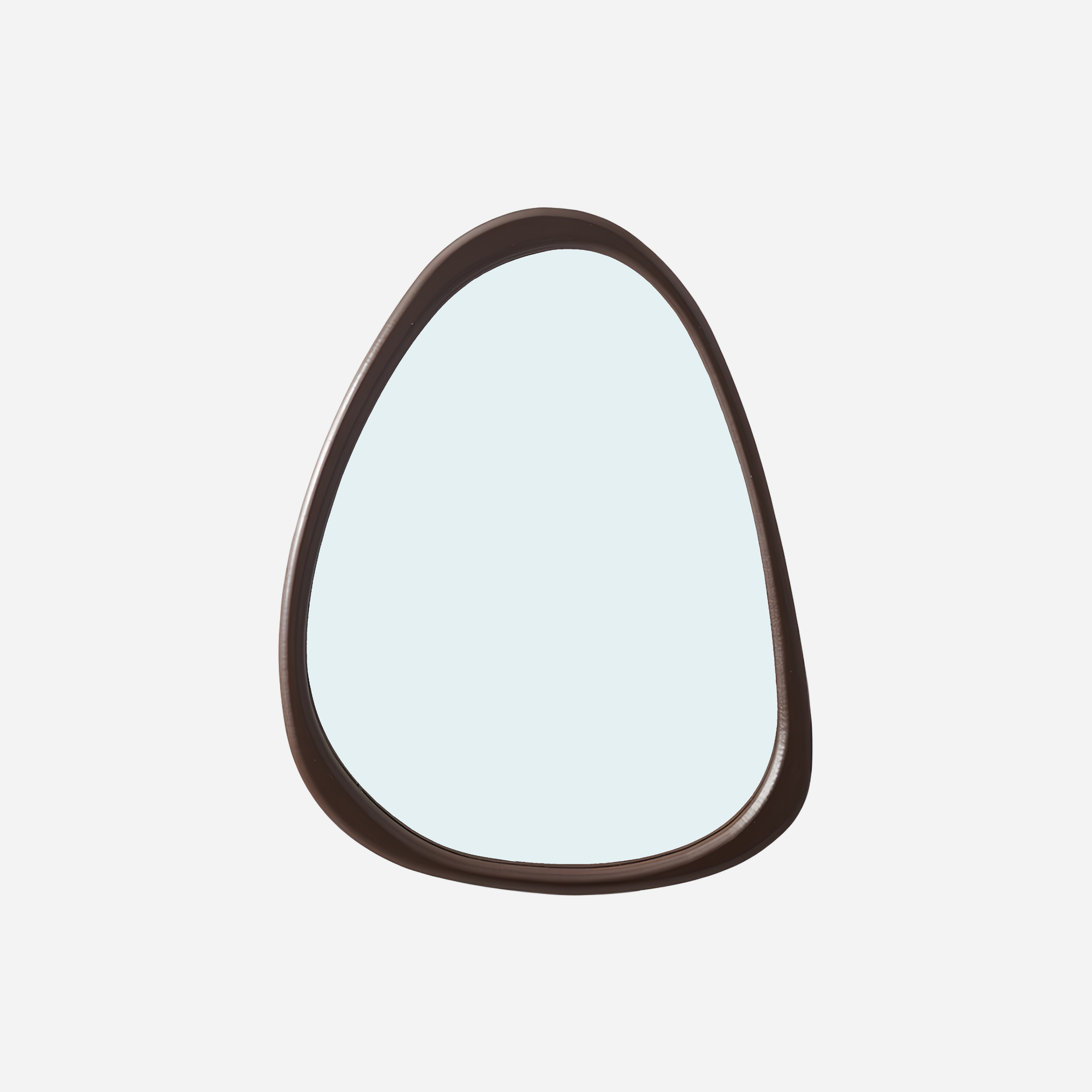 Oval mirror with a dark brown frame on a light gray background